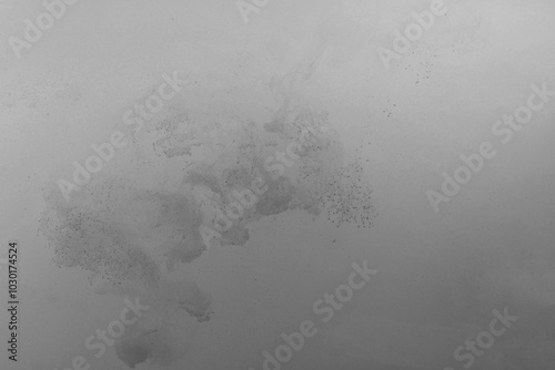 Black color-ink dye melt on white background,Abstract smoke pattern,Colored liquid dye,Splash paint