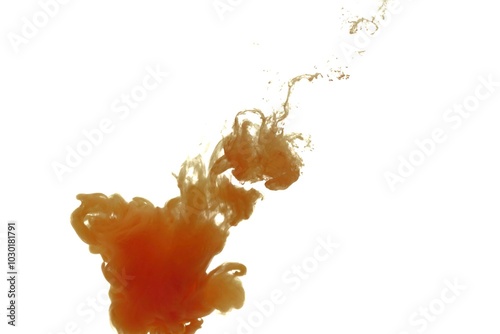 Orange color dye melt on white background,Abstract smoke pattern,Colored liquid dye,Splash paint