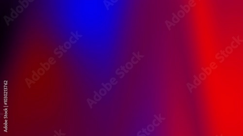 Abstract colorful blurred gradient background with shades of red, blue, and purple.
