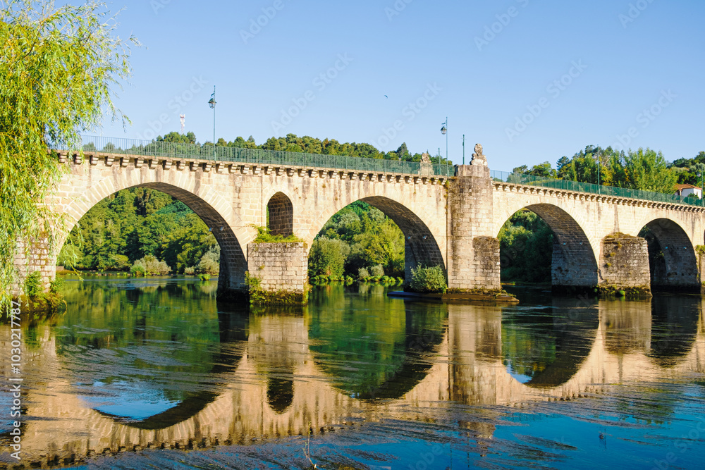 Old Stone bridge over the Lima river in Ponte da Barca. Portugal Old Stone bridge over the Lima river in Ponte da Barca. Portugal