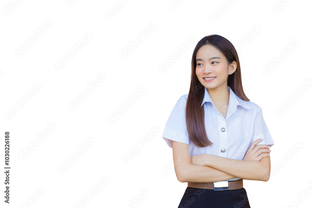 Portrait of an adult Thai student in university student uniform. Asian beautiful girl standing smiling happily and confidently with her arms crossed while isolated white background. Portrait of an adult Thai student in university student uniform. Asian beautiful girl standing smiling happily and confidently with her arms crossed while isolated white background.