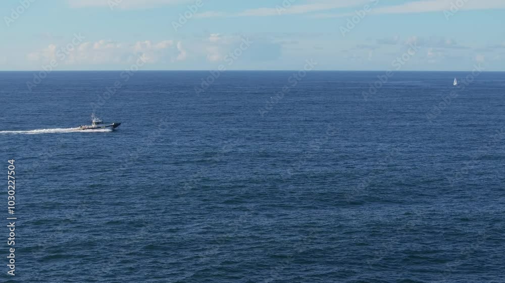 Stunning View Of Boat Cruising Across The Sea At Mera Beach In Galicia, Spain. static shot