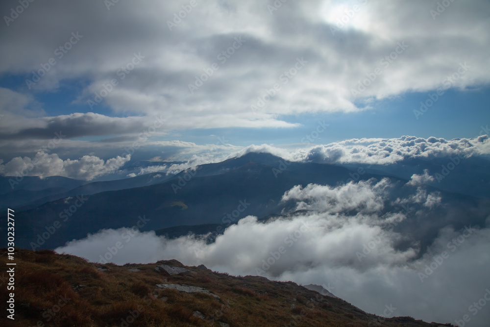 Between heaven and earth. Fog, clouds, nebula and clouds in the mountains. Beautiful landscape. Between heaven and earth. Fog, clouds, nebula and clouds in the mountains. Beautiful landscape.