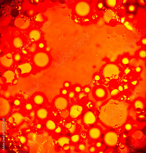 orange background with bubbles, oily water
