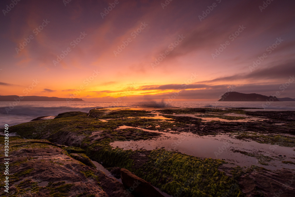 Sunrise over the coastal village of Pearl Beach Sunrise over the coastal village of Pearl Beach