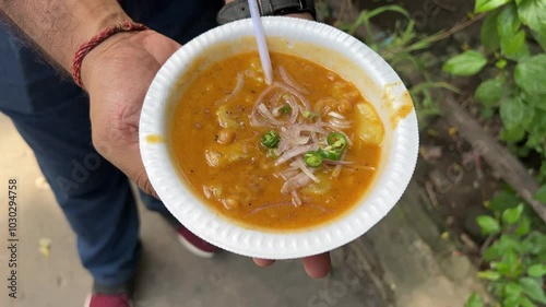 Cinematic shot of Mutton Ghugni with goat fat served in a white plate in Kolkata. photo