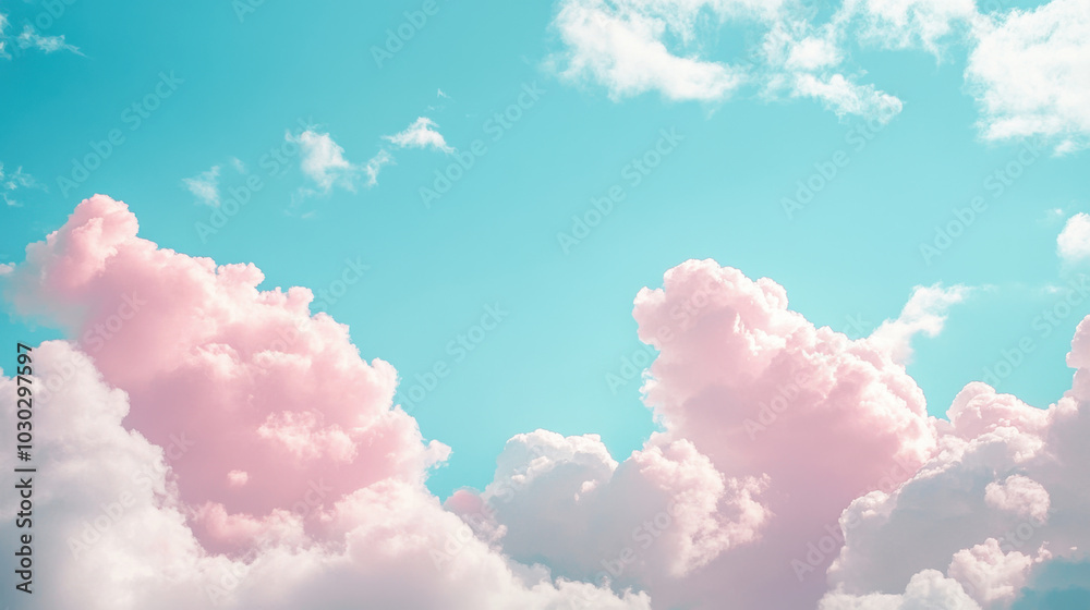 Soft pastel clouds drifting lazily under a serene blue sky at sunset Soft pastel clouds drifting lazily under a serene blue sky at sunset