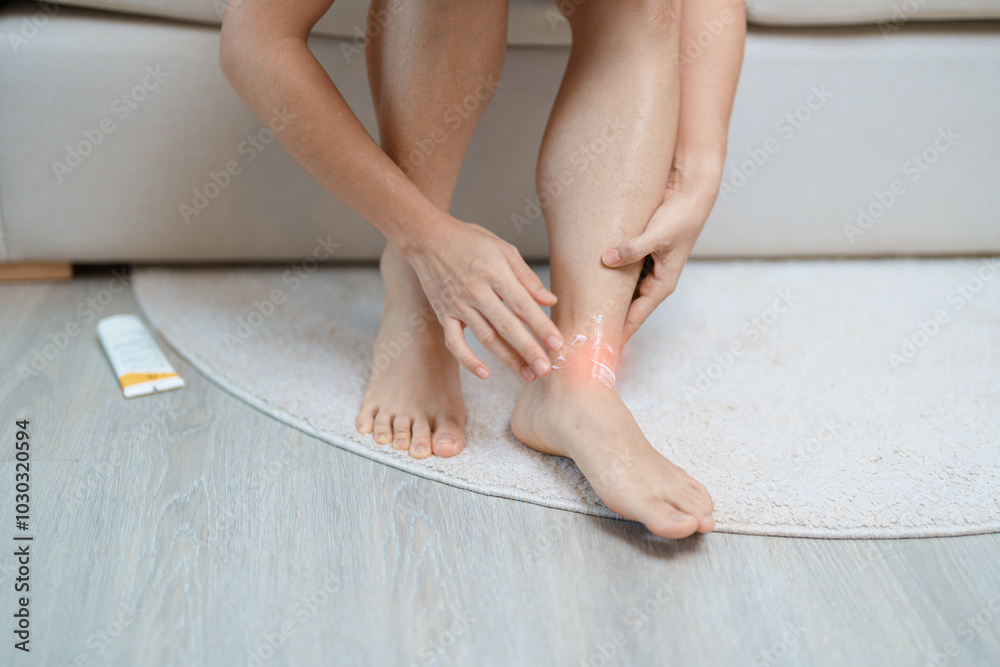 Arthritis and Muscle Pain Relief Cream concept. woman having leg pain due to Ankle Sprains or Achilles Tendonitis and Shin Splints ache. injuries, health and medical concept Arthritis and Muscle Pain Relief Cream concept. woman having leg pain due to Ankle Sprains or Achilles Tendonitis and Shin Splints ache. injuries, health and medical concept