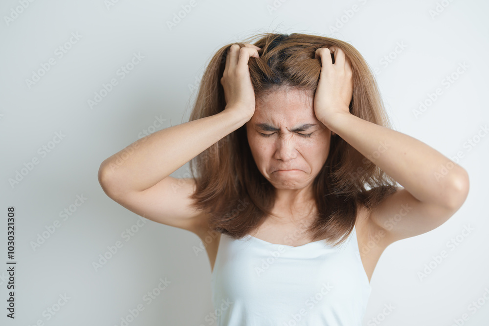 Stress, Sad and unhappy concepts. Alone asian Woman having headache, Young female feeling frustrated, exhausted and suffering Stress, Sad and unhappy concepts. Alone asian Woman having headache, Young female feeling frustrated, exhausted and suffering