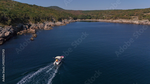 Small Tourist boat around  small bay