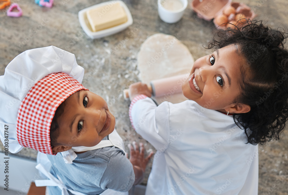 © DavisShared/peopleimages.com - Children, portrait and baking in home with rolling pin, family bonding and together for food prep. Kids, high angle and siblings for learning to cook in kitchen, dough and ingredients for pastry © DavisShared/peopleimages.com - Children, portrait and baking in home with rolling pin, family bonding and together for food prep. Kids, high angle and siblings for learning to cook in kitchen, dough and ingredients for pastry
