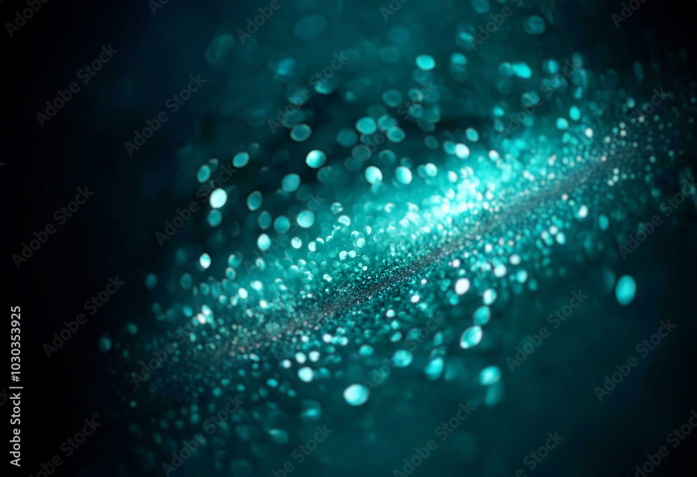 Abstract teal bokeh with a dark background. Abstract teal bokeh with a dark background.