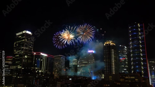 Fireworks over City Skyline at Night