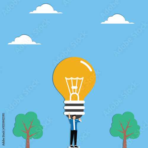 Businessman holding giant lightbulb symbolizing innovative idea and creative thinking