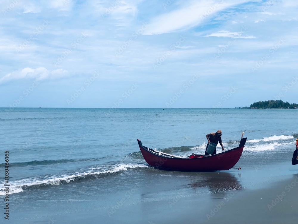 Indonesia, Aceh-15 October 2024, Beautiful beach views and fishermen in the Aceh sea. Indonesia, Aceh-15 October 2024, Beautiful beach views and fishermen in the Aceh sea.