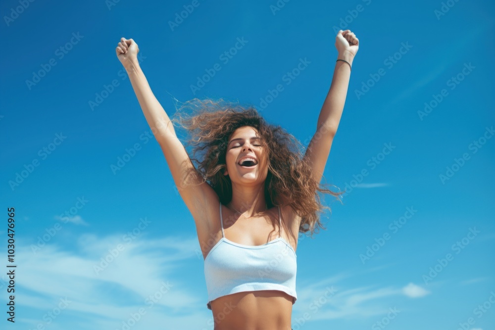 Woman wearing tanktop hands up adult blue sky. Woman wearing tanktop hands up adult blue sky.