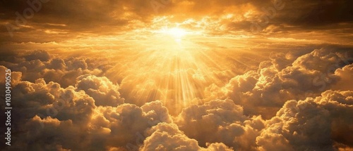 Heavenly golden light streaming through clouds