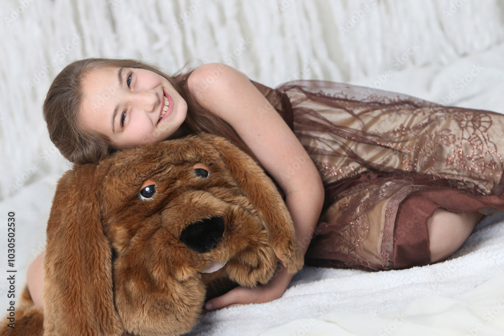 cute preteen cheerful girl in with stuffed animal toy dog on light background cute preteen cheerful girl in with stuffed animal toy dog on light background