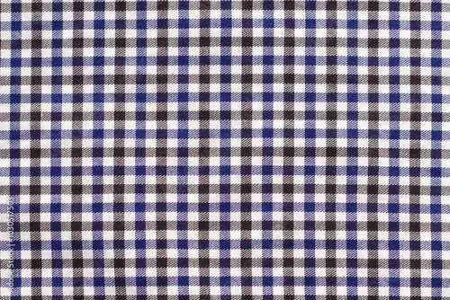 Black, white and blue plaid fabric background