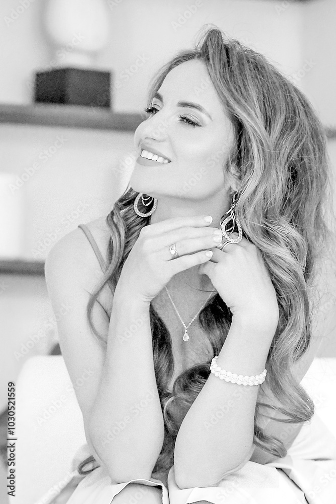 Obraz premium Stunning black and white portrait of a beautiful woman. Confident and happy. Beauty concept