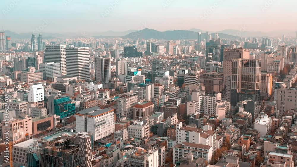 SEOUL, SOUTH KOREA - SEPTEMBER 9, 2024: Aerial view of the bustling cityscape filled with modern architecture. SEOUL, SOUTH KOREA - SEPTEMBER 9, 2024: Aerial view of the bustling cityscape filled with modern architecture.