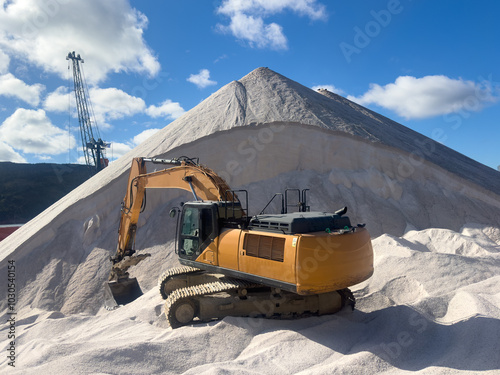 Tableau sur toile A stockpile of salt or sodium chloride road salt, rocksalt stockpiled for winter snow, and ice deicing controls