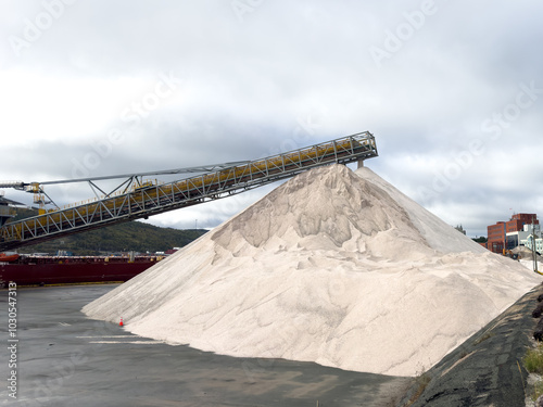 Quadro su tela A stockpile of salt or sodium chloride road salt, and rocksalt stockpiled for winter snow and ice deicing controls