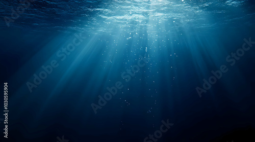 Deep Blue Ocean Underwater Scene with Sun Rays and Bubbles