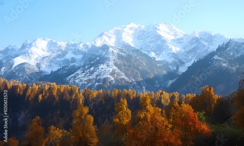 A mountain in the USA in autumn, with scenic snow-covered mountains in the background, tourists travel to enjoy nature and life concepts.