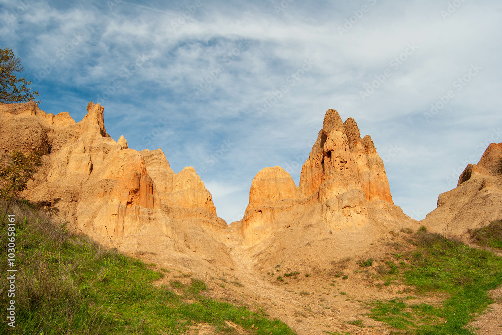 A photo capturing the fascinating natural phenomenon of sand pyramids. A photo capturing the fascinating natural phenomenon of sand pyramids.