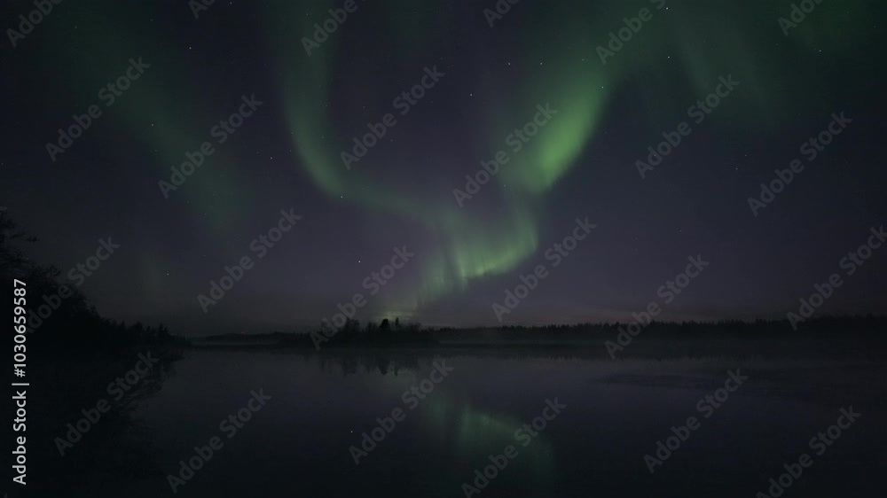 Real-time auroras reflecting from a still lake Real-time auroras reflecting from a still lake