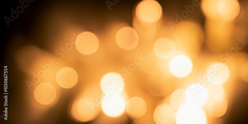 Warm golden bokeh lights creating a dreamy abstract background