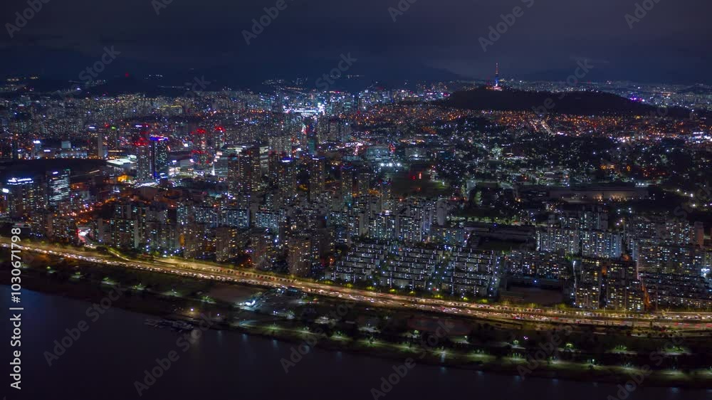SEOUL, SOUTH KOREA - SEPTEMBER 9, 2024: Night view of Seoul with illuminated bridges over the Han River SEOUL, SOUTH KOREA - SEPTEMBER 9, 2024: Night view of Seoul with illuminated bridges over the Han River