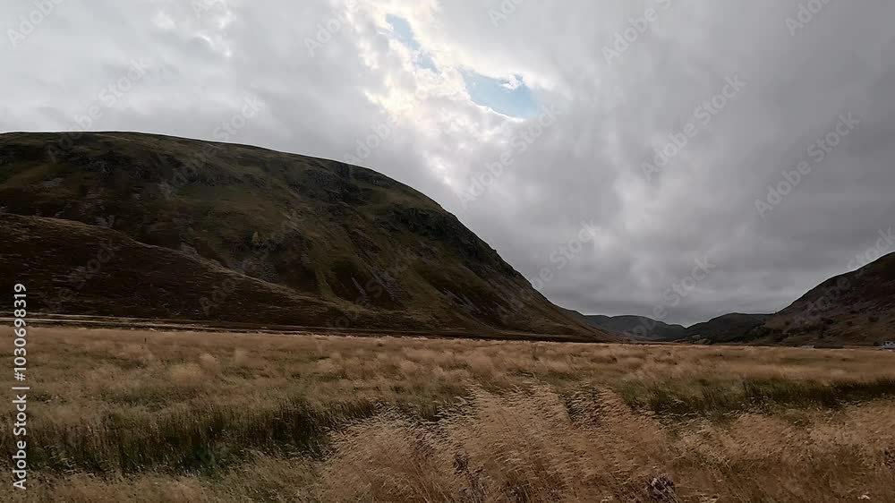 driving point of view wide angle dashboard Scottish highlands Cairngorms national park hills mountains. driving point of view wide angle dashboard Scottish highlands Cairngorms national park hills mountains.