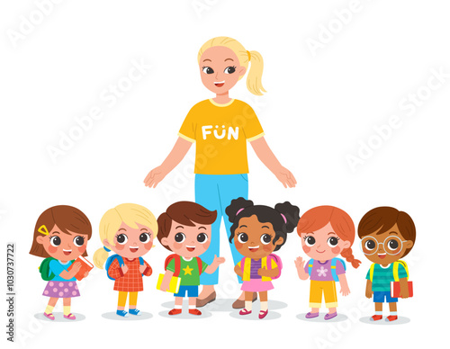 Group of elementary school children and teacher standing in the classroom and talking to each other. Happy teacher and kids meet and make friends at school.