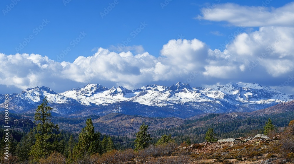 Fototapeta premium Snowy peaks of the Sierra Nevada with plenty of sky for copy space