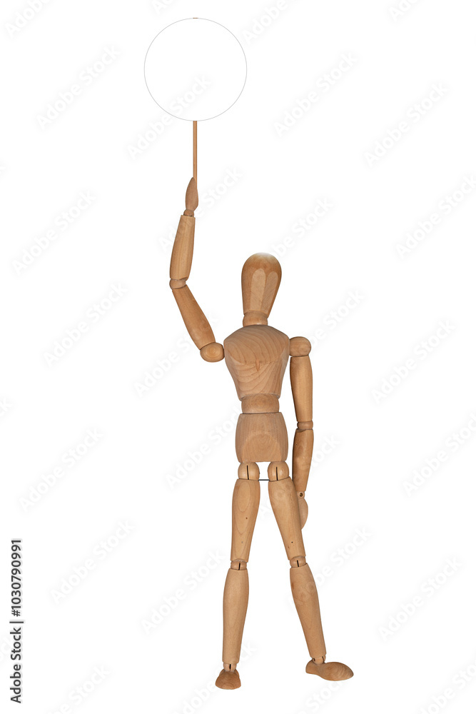 A wooden puppet doll marionette holding blank protest sign. Concept of emotional manipulation, world conspiracy theories., control and dictatorship. A wooden puppet doll marionette holding blank protest sign. Concept of emotional manipulation, world conspiracy theories., control and dictatorship.