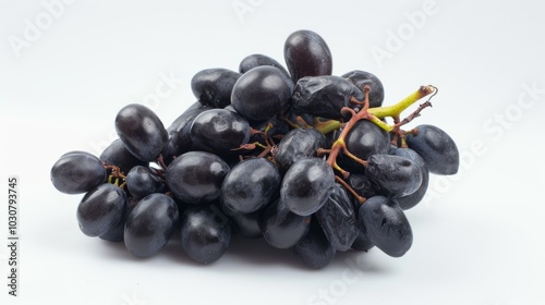 Gorgeous Contrast: Captivating Black Grapes on a Stunning White Backdrop -