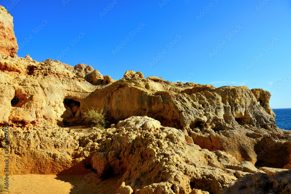 Algar Seco is a rock formation near Carvoeiro the rocks were formed over thousands of years by wind and waves today the resulting caves are a popular tourist destination in the Algarve Portugal Algar Seco is a rock formation near Carvoeiro the rocks were formed over thousands of years by wind and waves today the resulting caves are a popular tourist destination in the Algarve Portugal