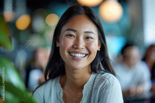 Woman Smiling at Table