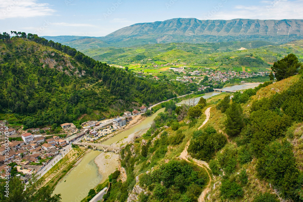 A view of the Gorica quarter of Berat in Albania taken from Berat Castle. Berat is UNESCO listed and is known as City of a Thousand Windows. Mali Partizan Mountain left, Osum River foreground A view of the Gorica quarter of Berat in Albania taken from Berat Castle. Berat is UNESCO listed and is known as City of a Thousand Windows. Mali Partizan Mountain left, Osum River foreground