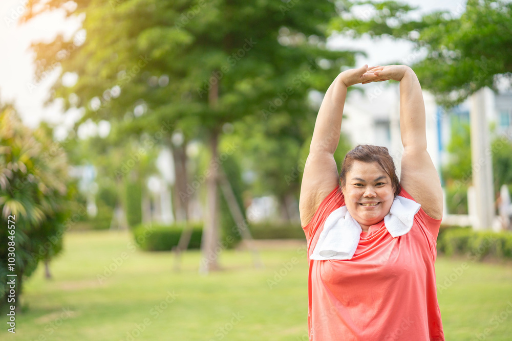 Overweight Asian women practice yoga in the park to strengthen their body and help them lose weight.Young woman is happy to motivation exercise or outdoor in the garden to control or lose weight Overweight Asian women practice yoga in the park to strengthen their body and help them lose weight.Young woman is happy to motivation exercise or outdoor in the garden to control or lose weight