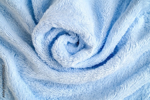 Blue Towel on Bed