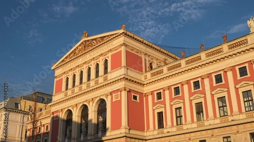 Wiener Musikverein building, a famous concert hall and landmark in Vienna, Austria, opened in 1870. Hyperlapse of the exterior, in the morning light.