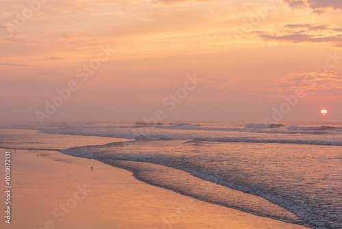 Avalon, New Jersey - Sunrise view of Ocean waves breaking onto the beach on this coastline town on the New Jersey Shore