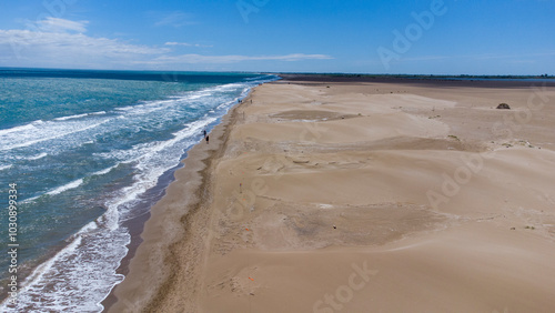 Sea and sand of the Ebro Delta beach photo