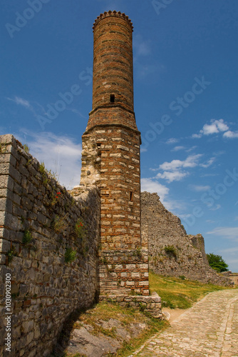 The minaret of the 14th century Red Mosque ruins within the fortified Berat Castle, southern Albania. The castle is a blend of Byzantine, Ottoman and medieval Albanian architectural influences