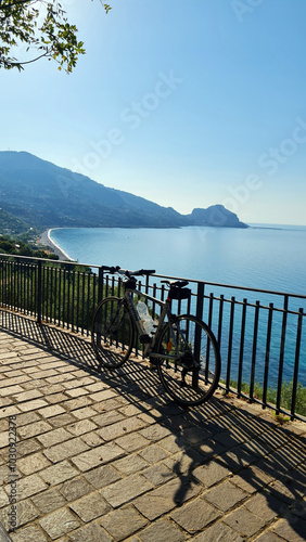 Exploring the island of Sicily in bicycle. Cefalu, Italy. 