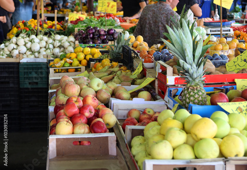 Stall of a greengrocer full of fruit in a street market