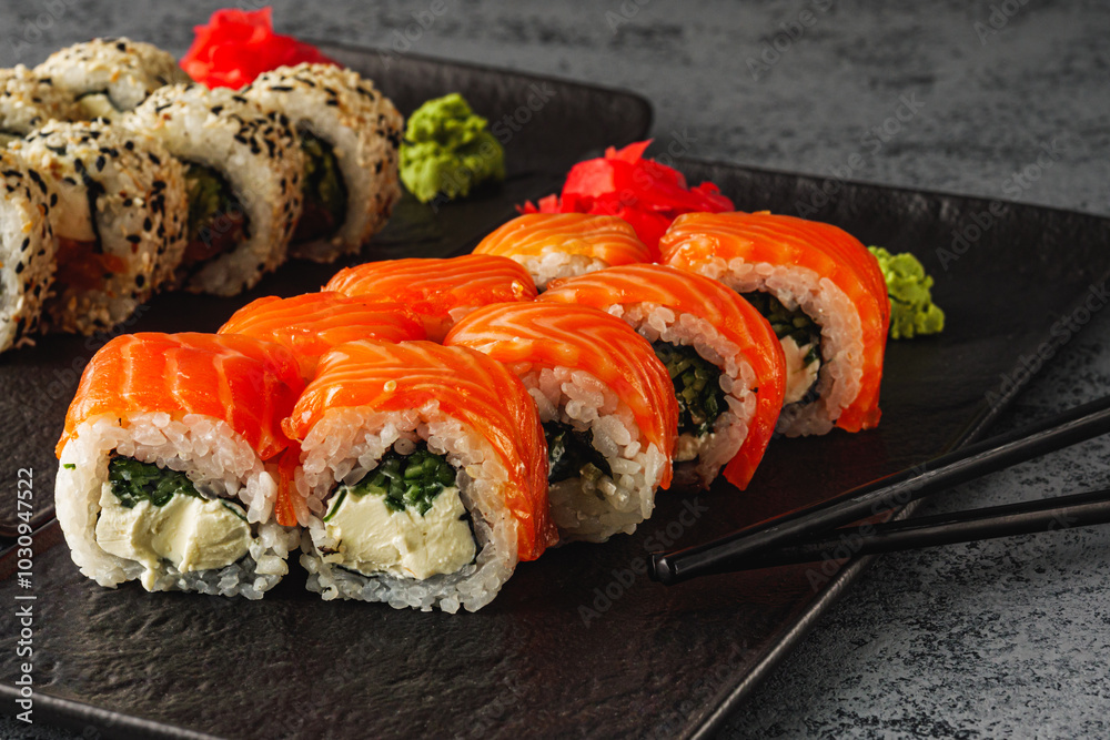 Fresh Sushi Rolls with Salmon and Tuna, Japanese Cuisine on a Gourmet Seafood Plate Fresh Sushi Rolls with Salmon and Tuna, Japanese Cuisine on a Gourmet Seafood Plate